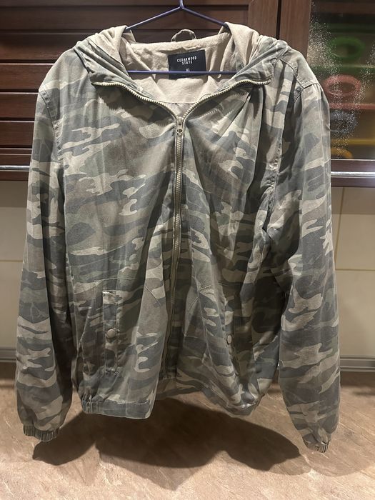 Куртки і плащ б/у