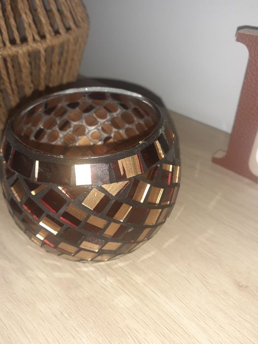 Porta velas castanho e dourado