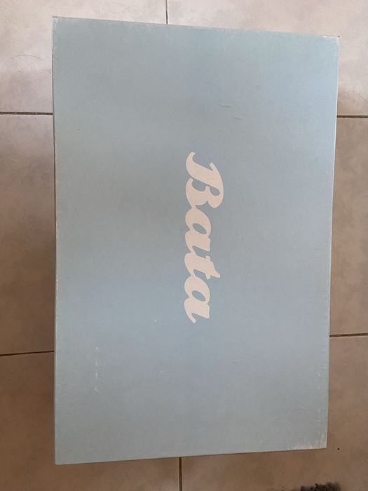 Botas castanhas de cano alto