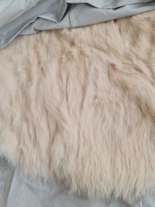 Женский пуховик с мехом