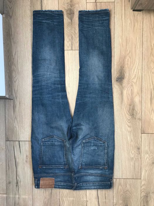 Spodnie jeansowe z dziurami Denim.Co rozm. W34 L30