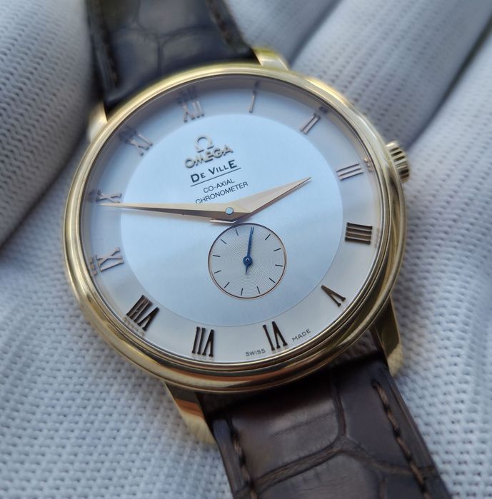 Швейцарскій годинник Omega De Ville
