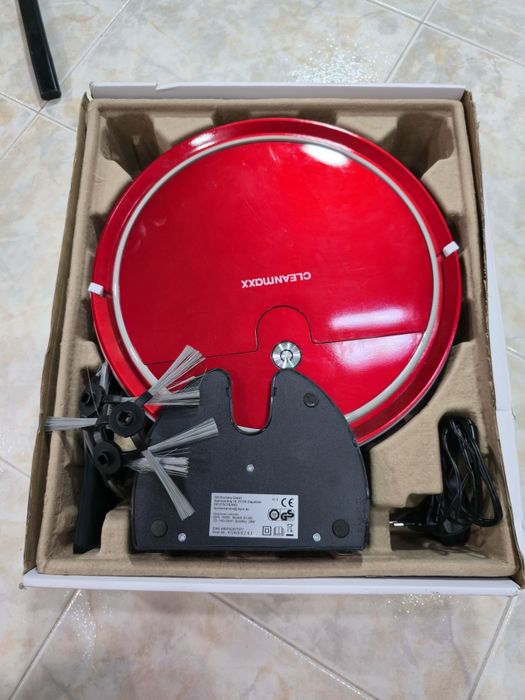 Aspirador robô vermelho
