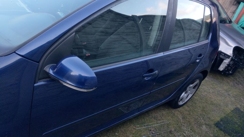 Drzwi lewe tylne granatowe zderzak błotnik prawy klapa Golf V 5 LD5Q