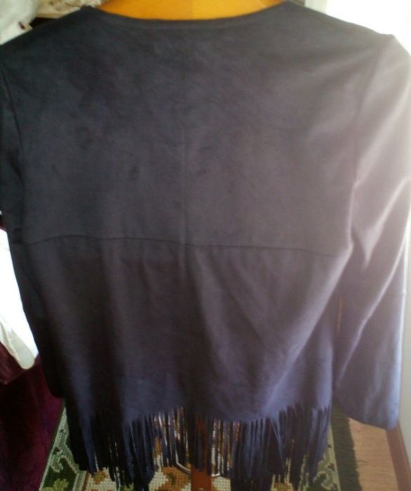 Casaco de pele e de pēssego