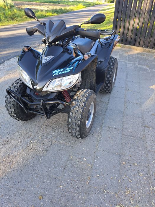 Quad Sym track runner 200