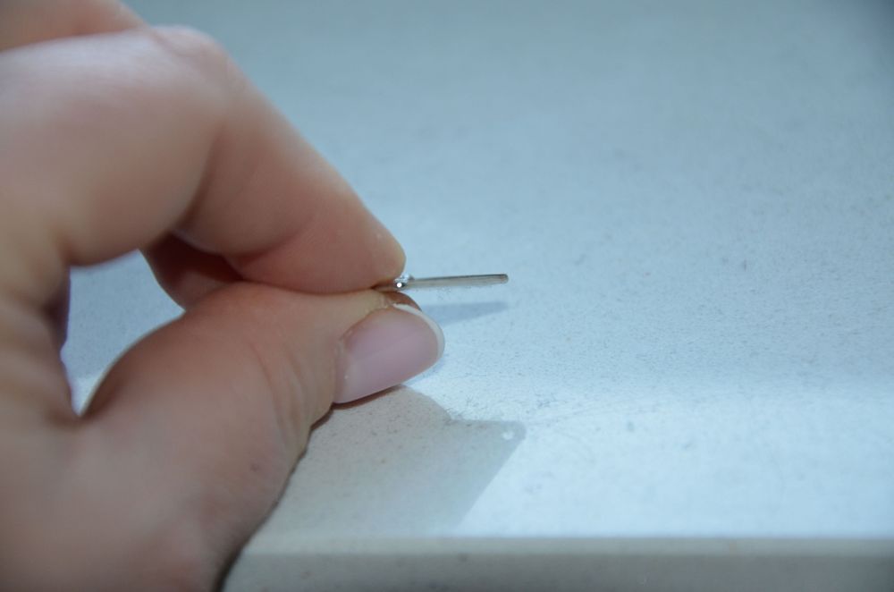 Guess przypinka zawieszka brelok