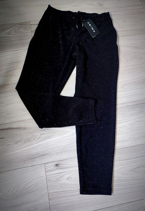 Nowe spodnie srebrna nitka 36/38