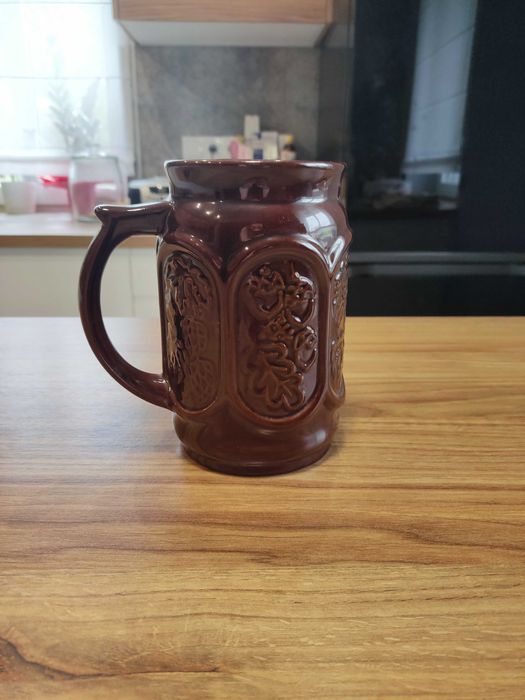 Stary gliniany kufel