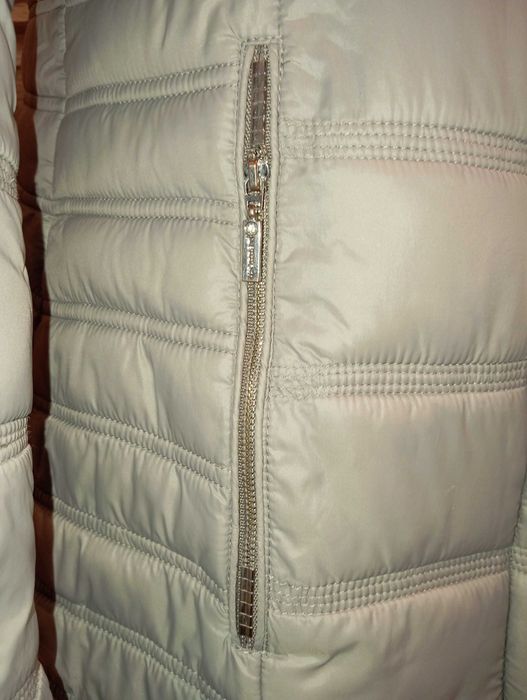 Damski pikowany płaszcz zimowy ze stójką Monari r.42 W.Gr.P.