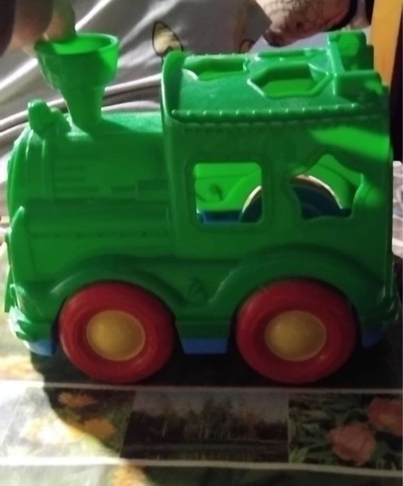 Детская игрушка машинка