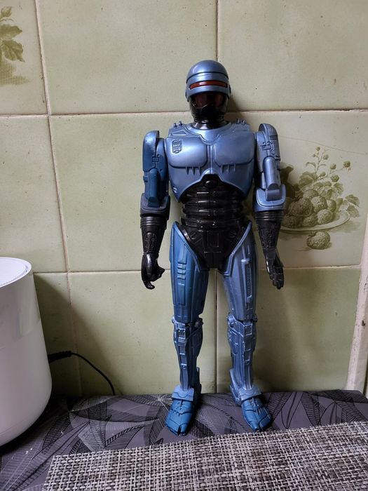 Boneco antigo articulado robocop que fala