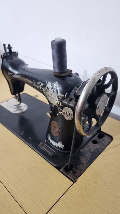 Máquina costura singer