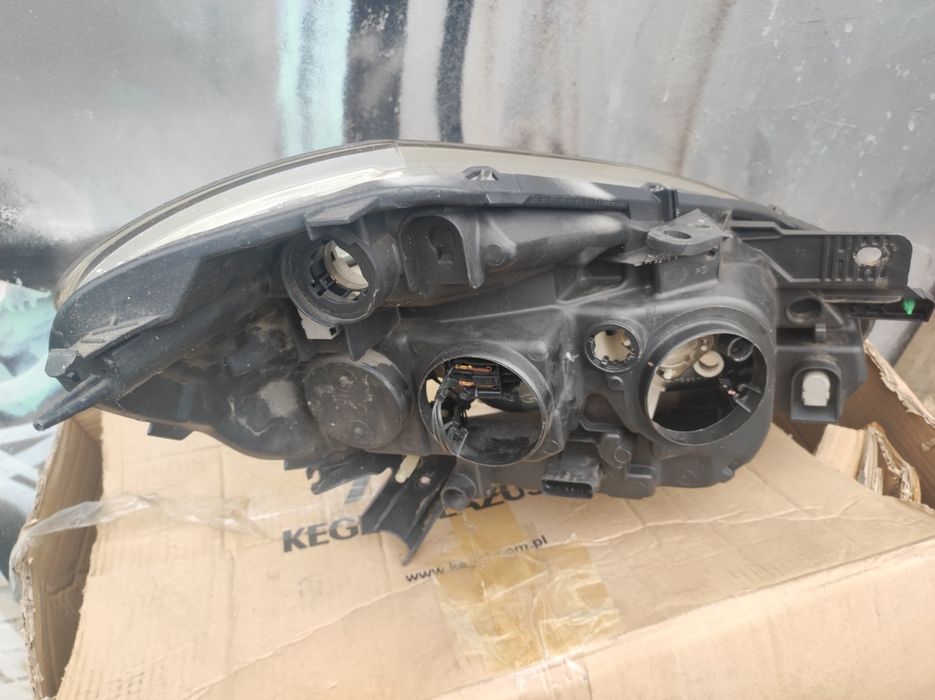 Lampa Clio 3 lift 09-12 lewa orginalna