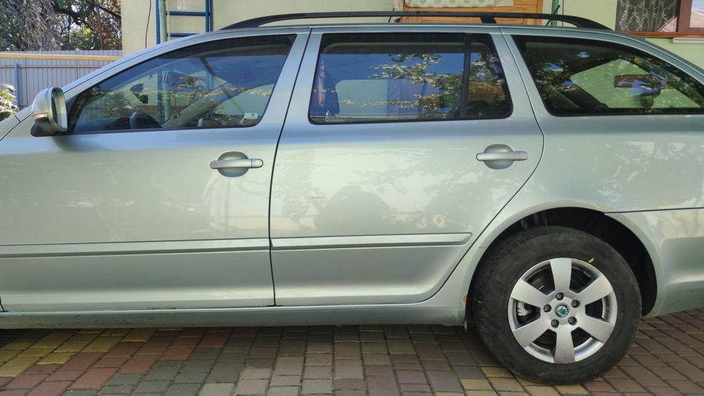 Skoda Octavia 2011 VIN TMBHT61Z5B2160246 фото оголошення 4 з 13