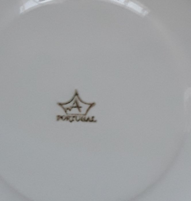 Pires de chávena de chá Artibus, antigo