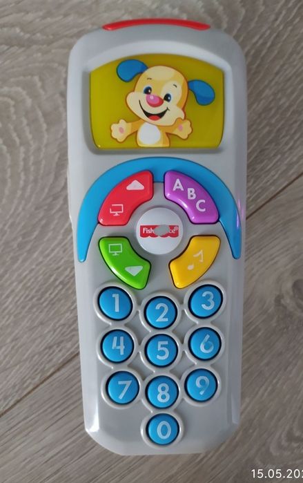 13. Fisher Price szczeniaczek uczniaczek oraz pilot