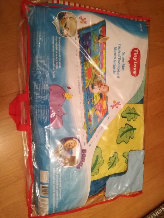 Tapete atividades Tinylove 1,5x1,0m ( em bom estado)
