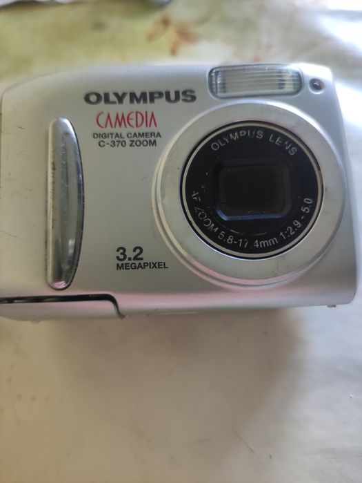 Olimpus Фотоопарати