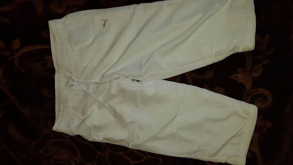 Sportowe spodnie firmy PUMA w rozmiarze L /40