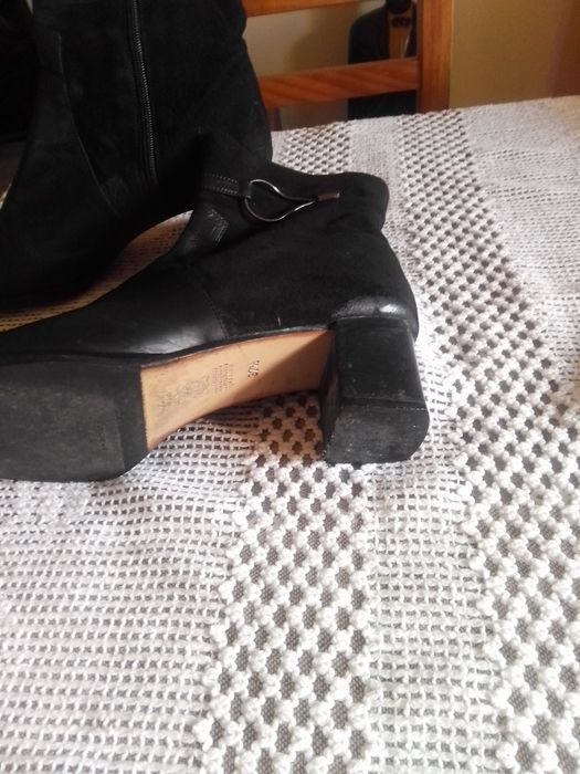 Botas cm pouco uso