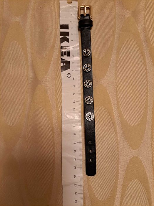 Pulseira Bimba y Lola preta e dourada