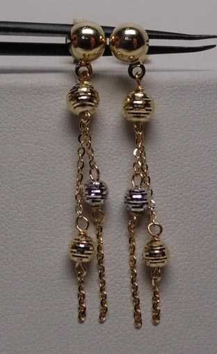 Złote wiszące kolczyki łańcuszki diamentowane dwukolorowe kulki.