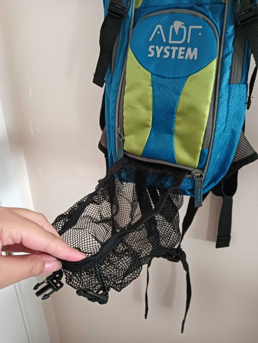 Mochila desportiva compacta ciclismo / trail – leve, estável e visível