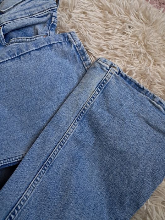 Dzwony jasnoniebieskie jeansowe Ginatricot XS wysoki stan