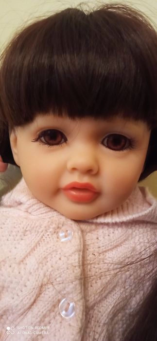 Реалістична лялька