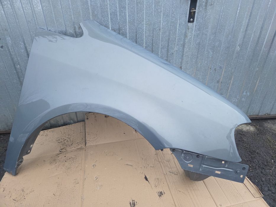 Blotnik prawy vw touran lift