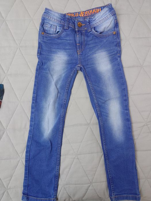 Przecierane jeansy rozm. 116