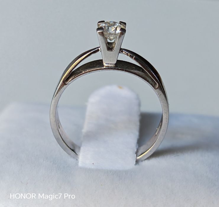 Pierścionek, złoto 9k, brylant 0,22 ct.
