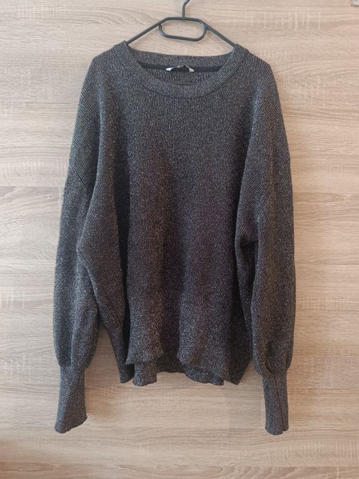 Damski czarny sweter elegancki ze srebrną nicią