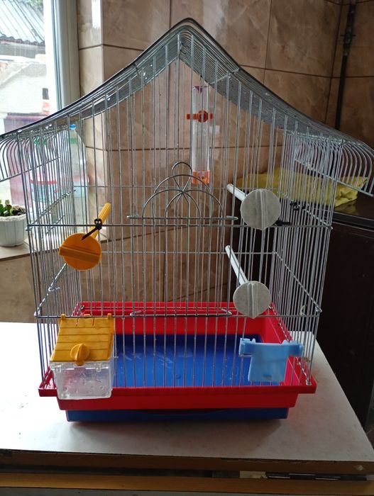 Клітка для папуги