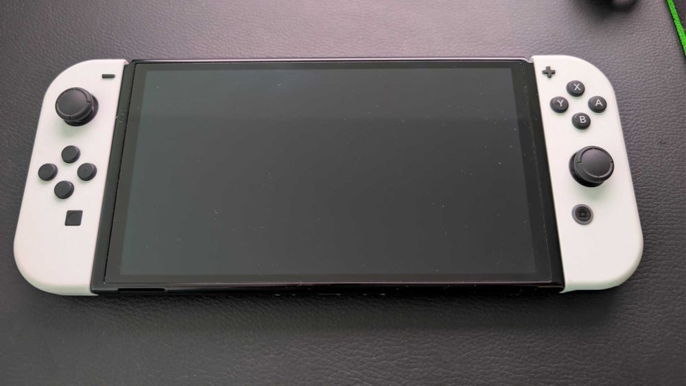 Nintendo Switch OLED + Ring Fit Adventure