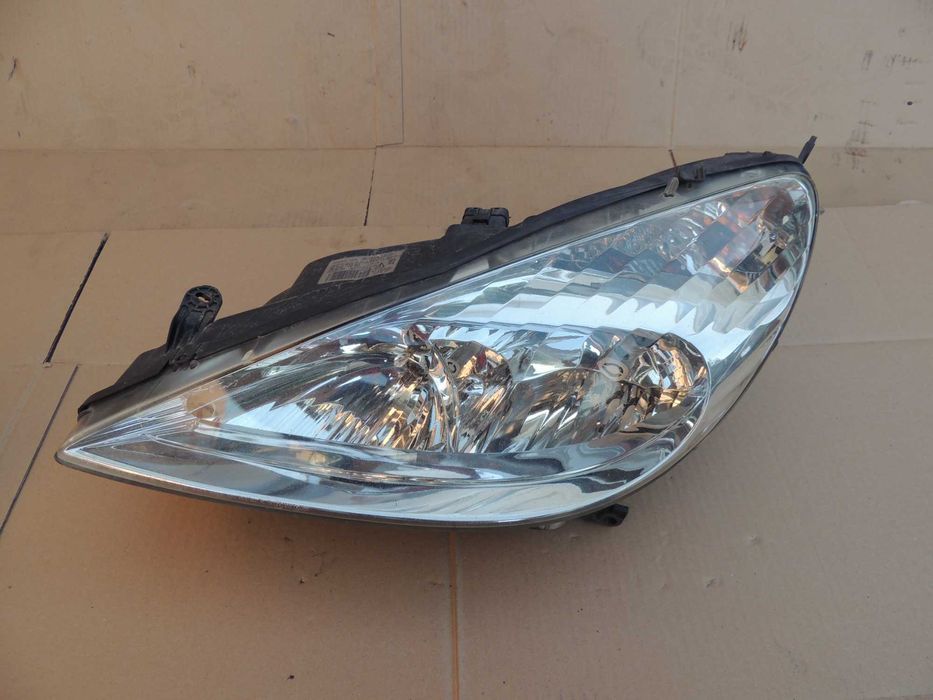 Lampa przednia lewa europejska xenon Peugeot 607 lift sprysk 04-10