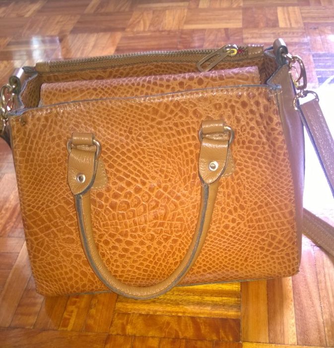 Mala/carteira em pele genuina