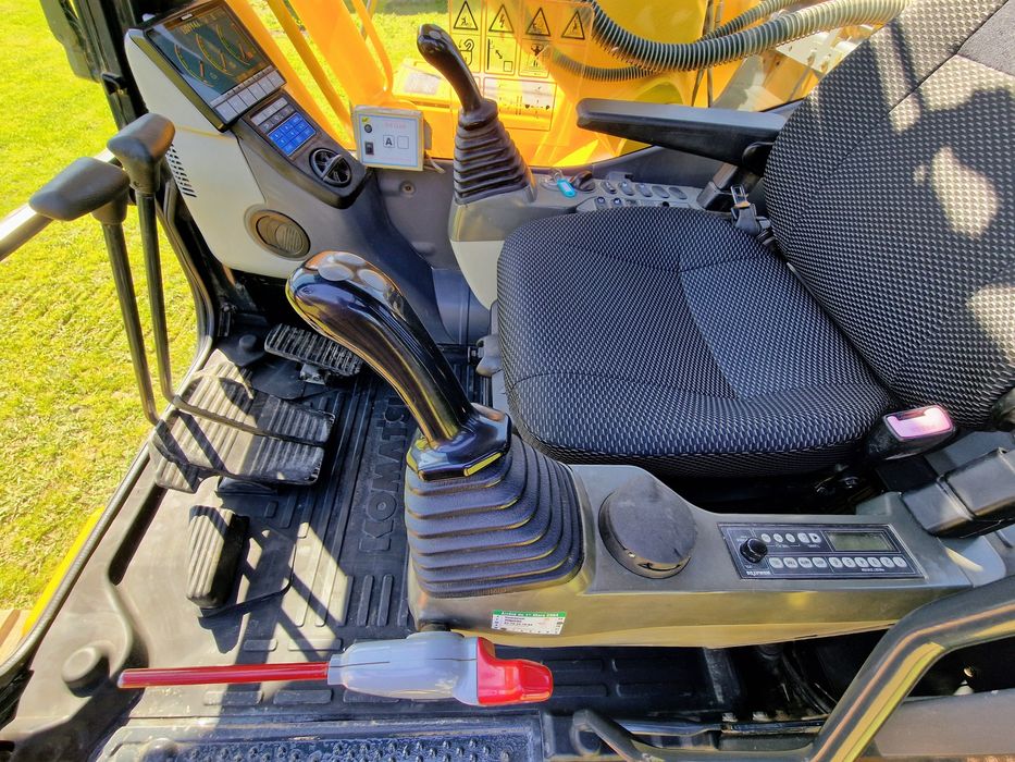 Escavadora komatsu pc 210