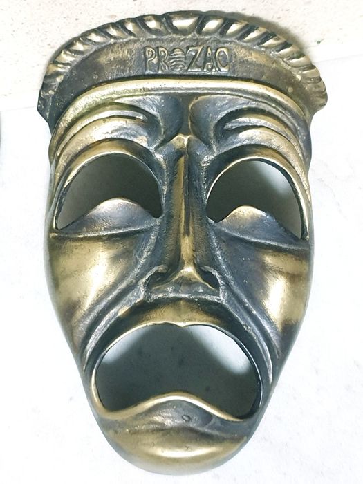 Interessantes mascaras de suspensão mural vintage em bronze