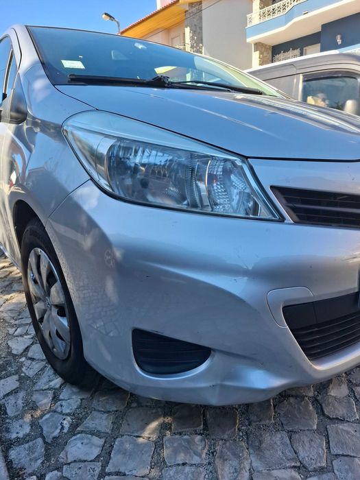 Toyota Yaris 1.0 VVTI ACTIVE + AC (Gasolina)