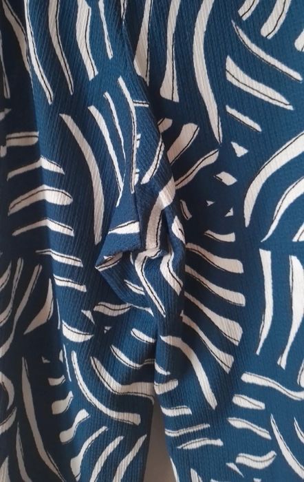 Materiałowe spodnie damskie H&M rozm.50