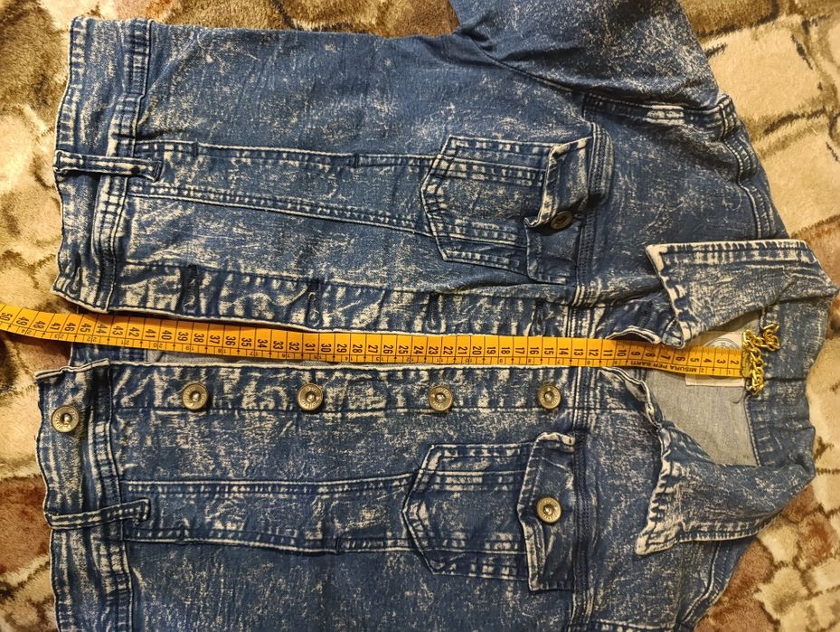 Джинсова куртка для дівчинки