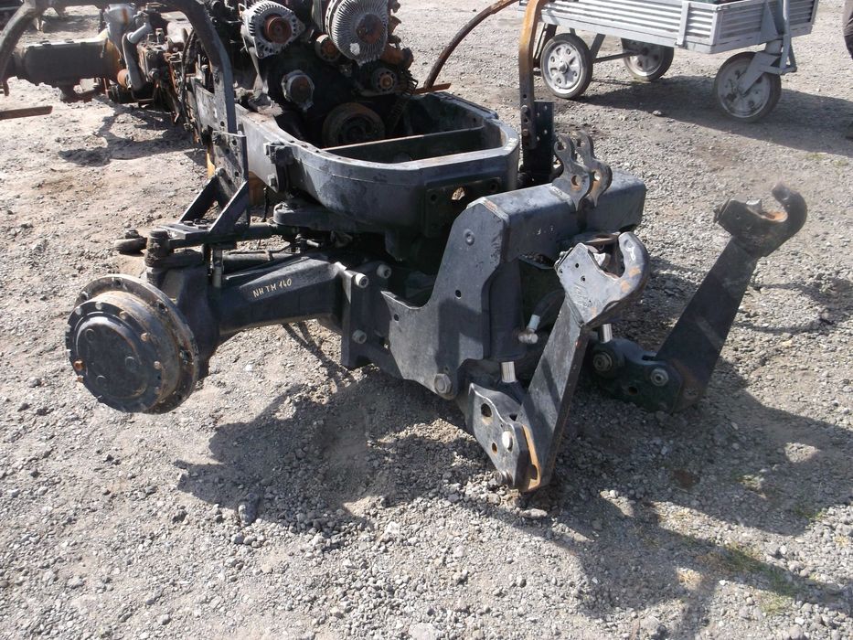 New Holland TM 140 --most,zwolnica,zwrotnica,półoś,tuz,podnośnik--