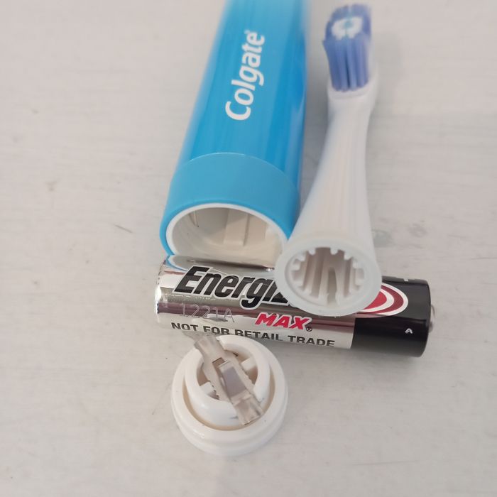 Escova de dentes a pilha, Colgate.