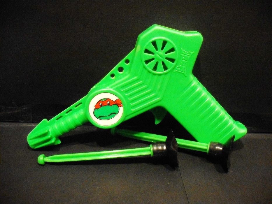 Pistola com dardos da tartaruga Ninja PEPE antiga