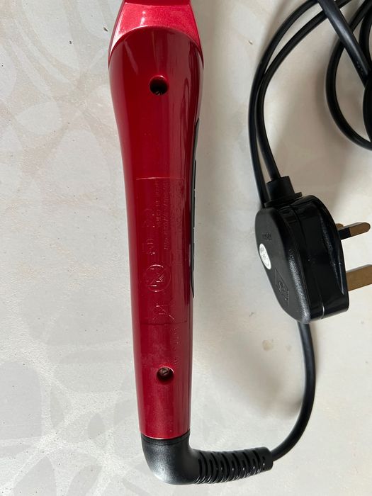 Конусна плойка Remington