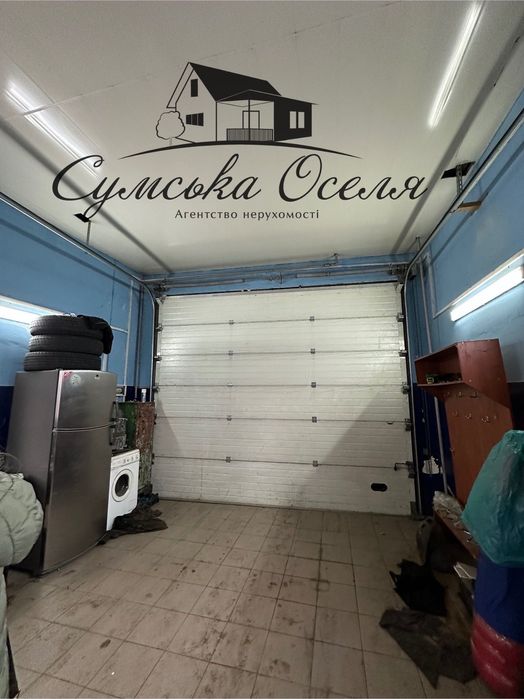 Діюче СТО з будинком на першій лінії