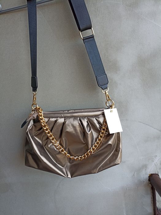 Miedziana złota z łańcuszkiem torebka i inne