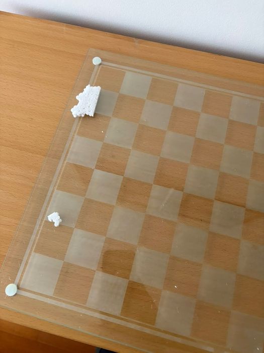 Jogo de xadrez em vidro